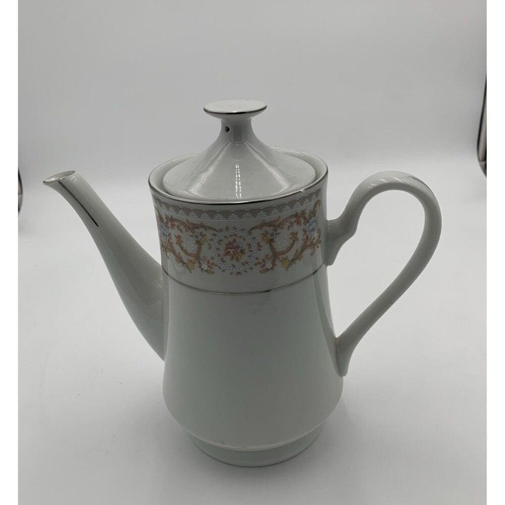 Beautiful HP Fine china Teapot. With A Band Of Flowers On top with Silver Trim.